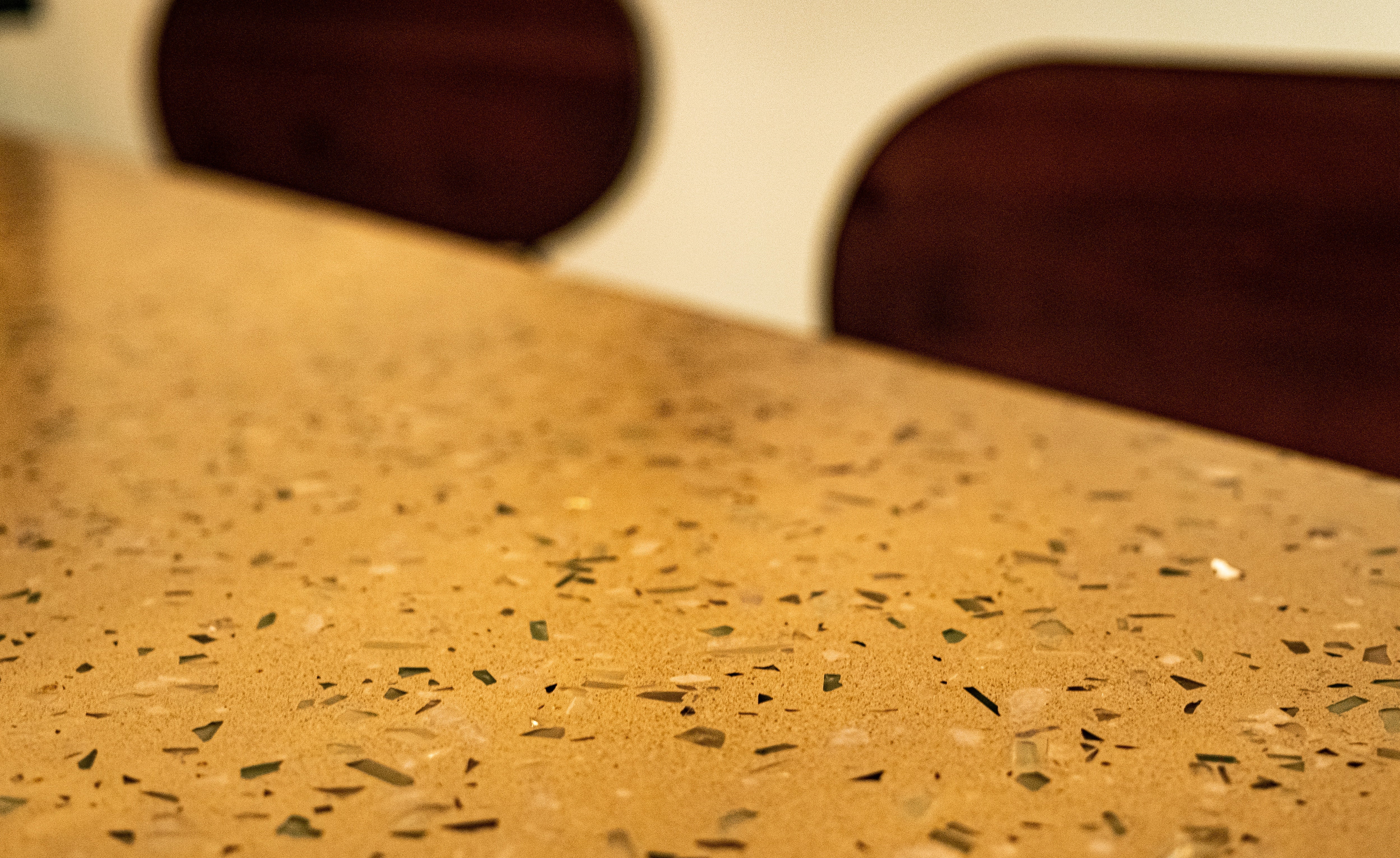 A rustic brown countertop epoxy resin installed in a commercial kitchen.