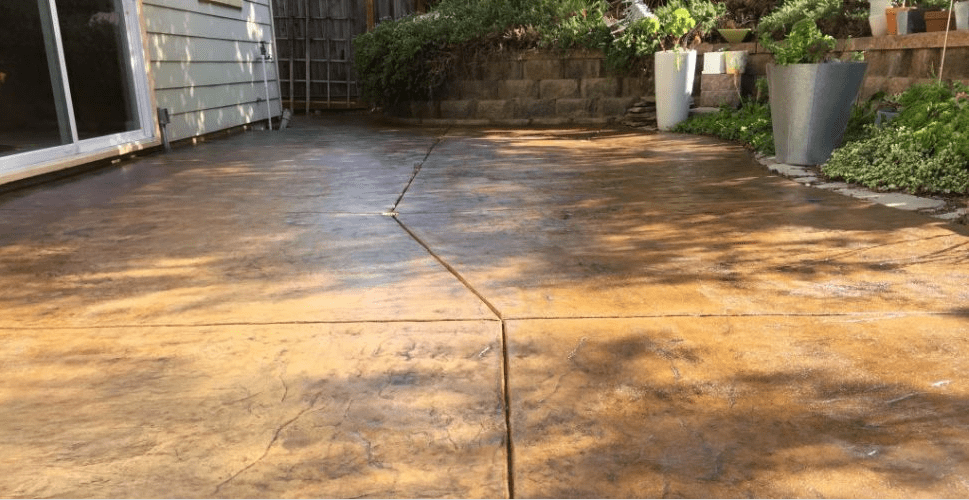 outdoor concrete floor stained with kemiko stain and sealer